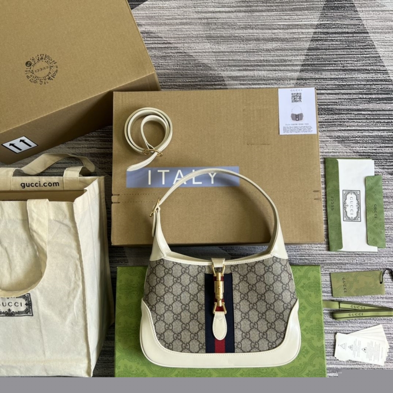 G*u*i top handle bags